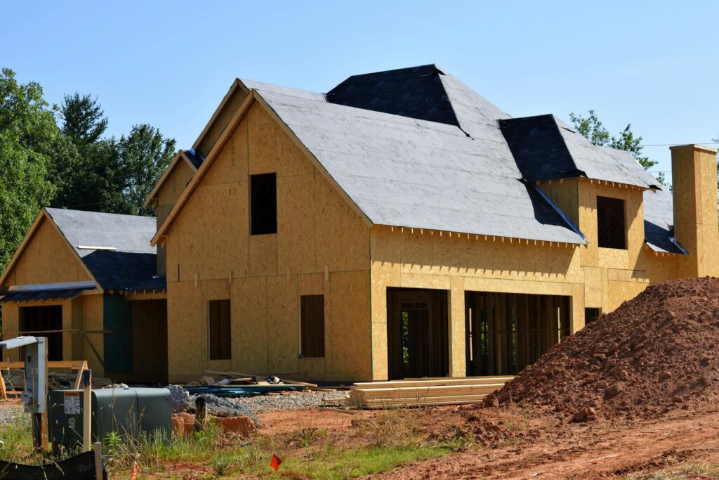 Experienced Ridge Runner Roofing team working on a residential roof in Davie County, NC.