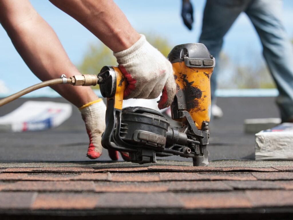 Expert contractors performing roof replacement in Hendersonville, NC, using high-quality materials