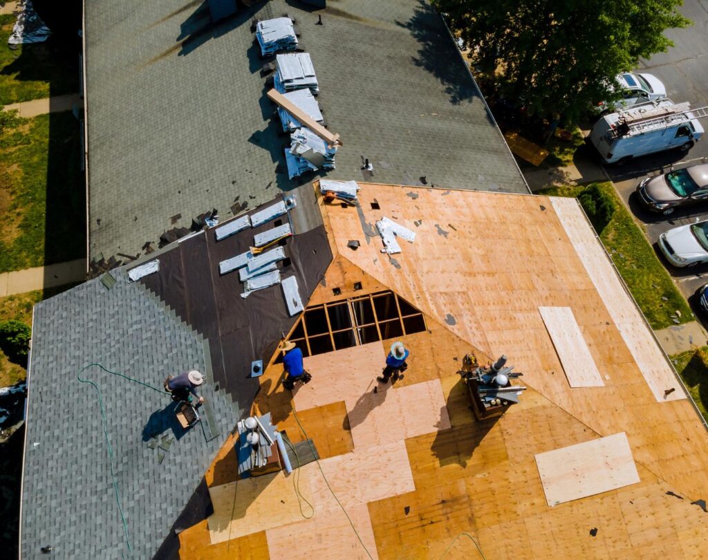 Expert team performing roof replacement in Asheville, NC, ensuring high-quality results