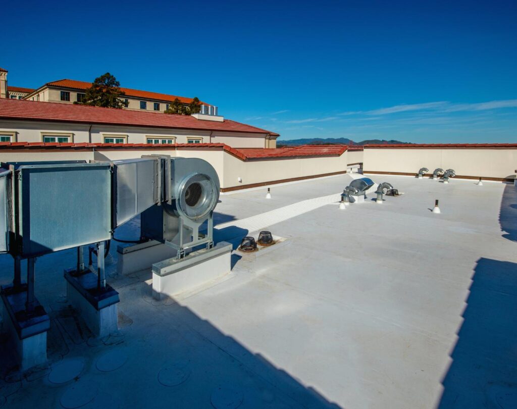 Commercial roofing in Beech Mountain, NC, being installed on a retail building by Ridge Runner Roofing
