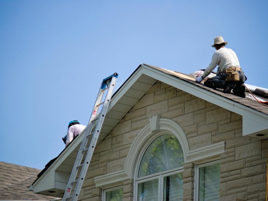 Experienced roofers performing roof repair in Statesville, NC, using high-grade materials