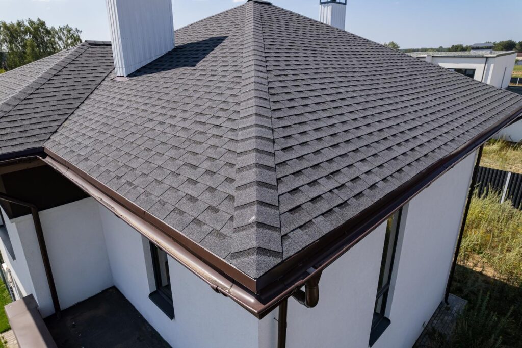 Local roofing company near me in Taylorsville, NC, restoring weather-damaged shingles and flashing