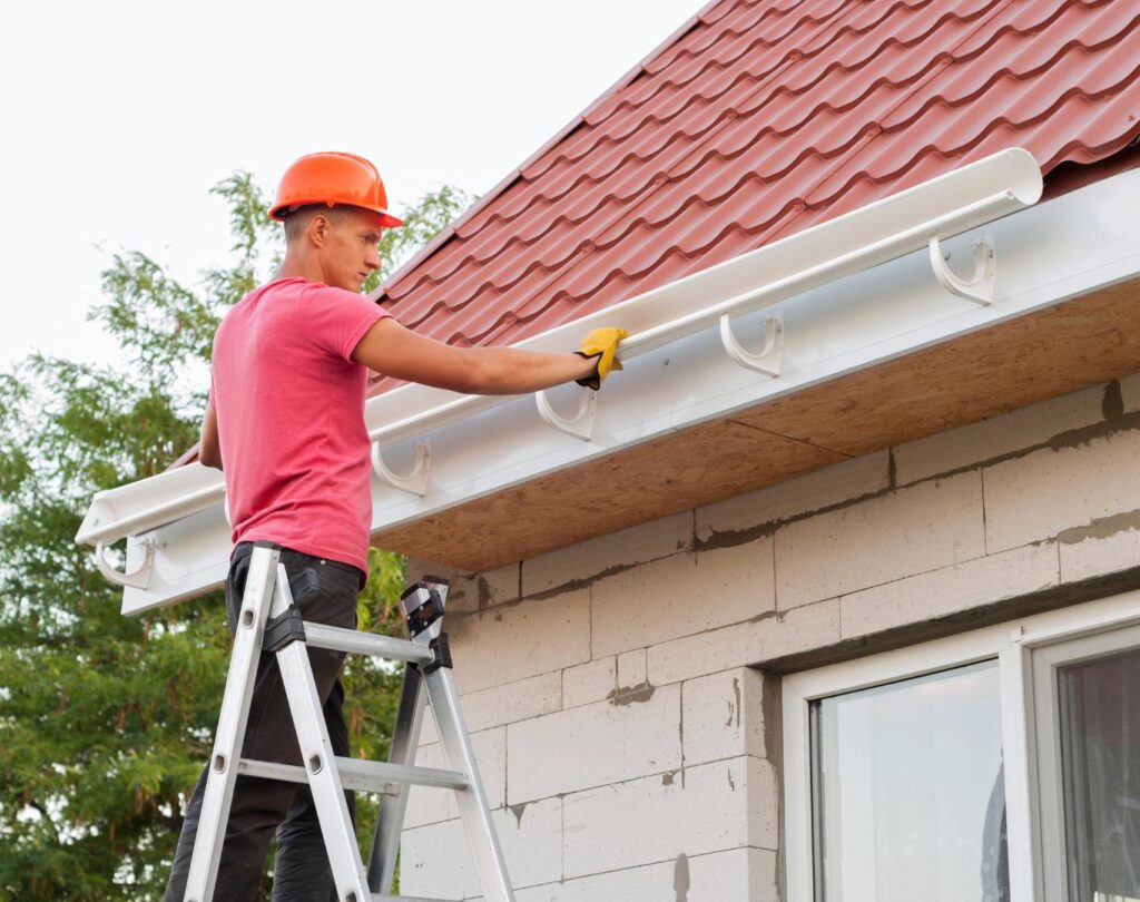 Seamless gutter system installed by a roofing company near me in Newland, NC