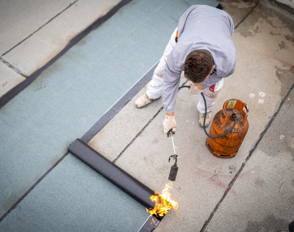 Local roofing company near me in Saluda, NC, installing durable commercial roofs
