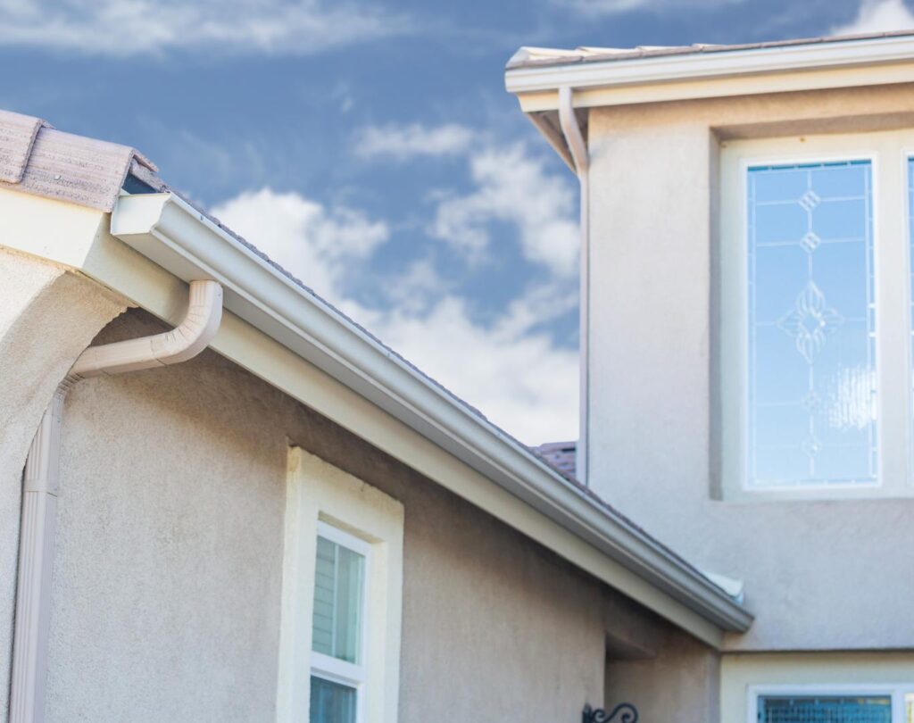 Local gutter company near me in Dobson, NC, installing seamless aluminum gutters