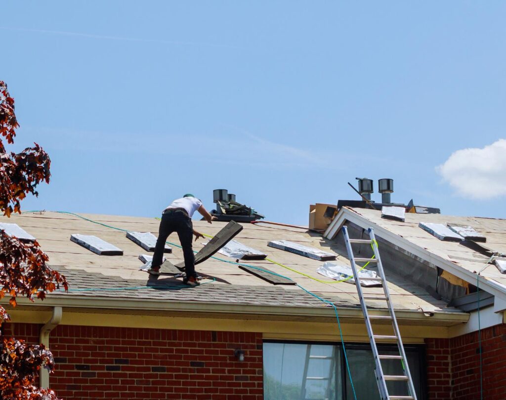 Local roofing company near me in Newland, NC, completing a shingle roof installation on a residential home